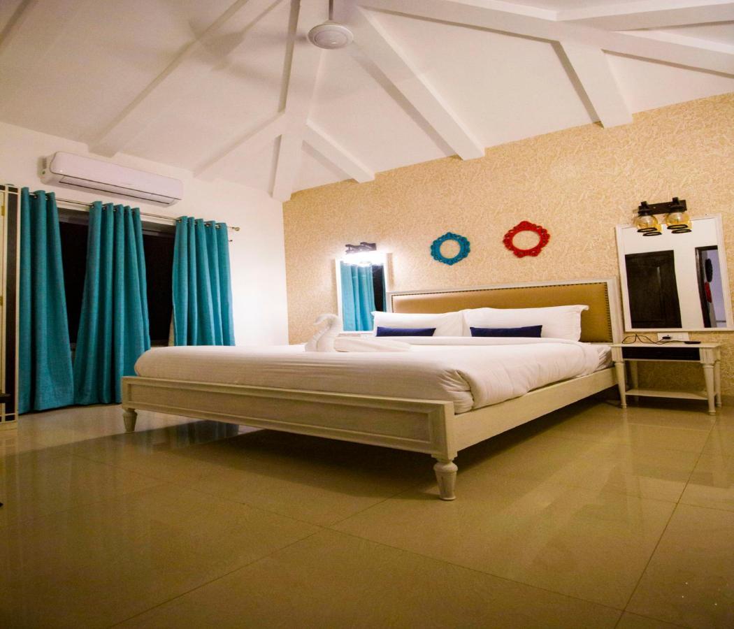Span Suites & Villa Morjim Exterior photo